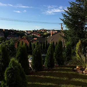 https://almagyar-vendeghaz.egerhotels.net